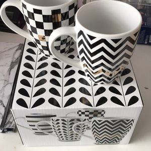 Gold and black design mugs